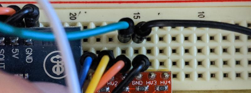Abstract article image showing wires and a circuit board connected together.